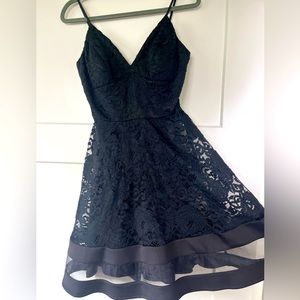 Black lacy formal dinner dress. Jodi kristopher size 7. Very sexy on.